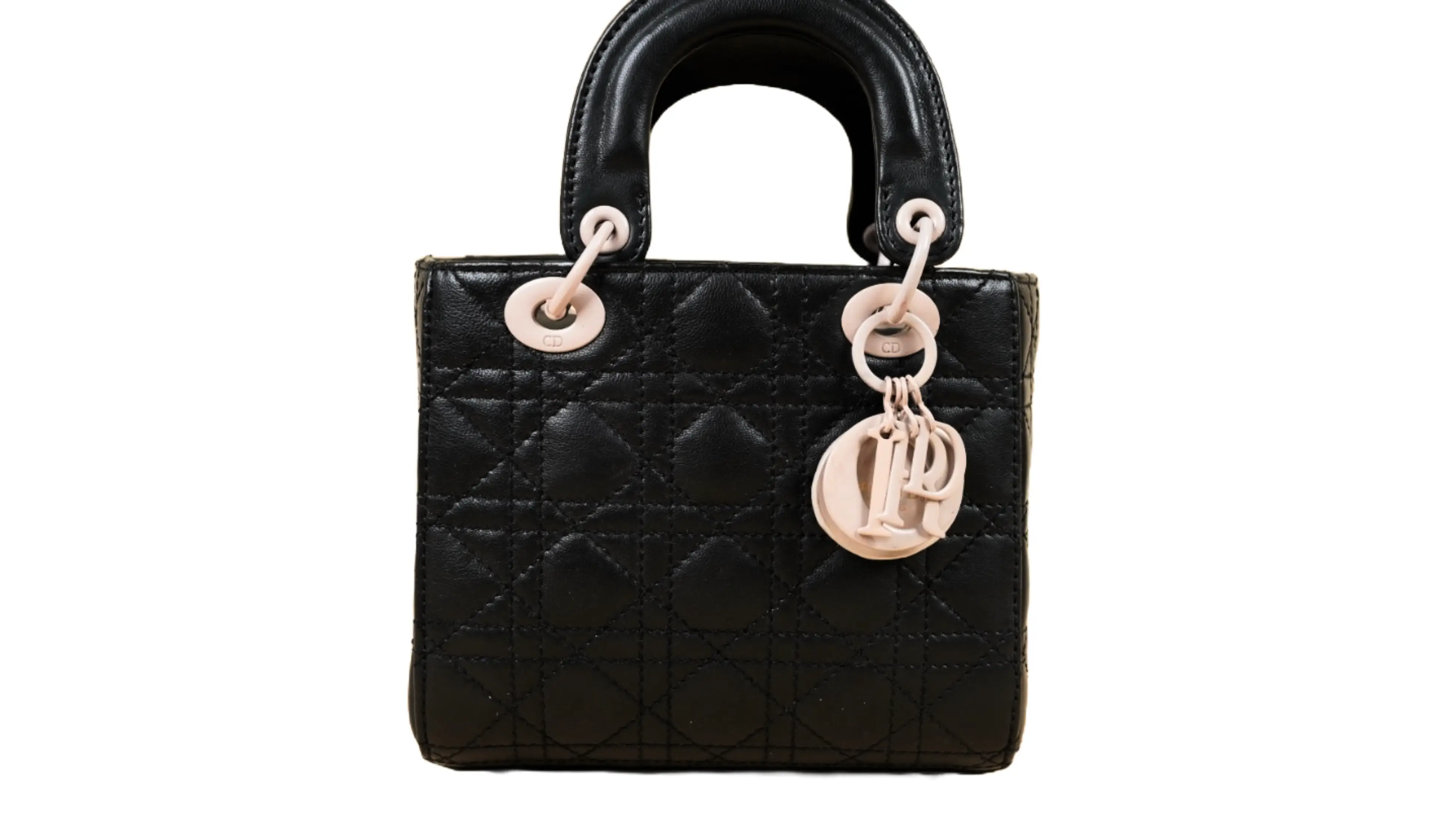 Before Dior colour restoration showing faded and uneven colour