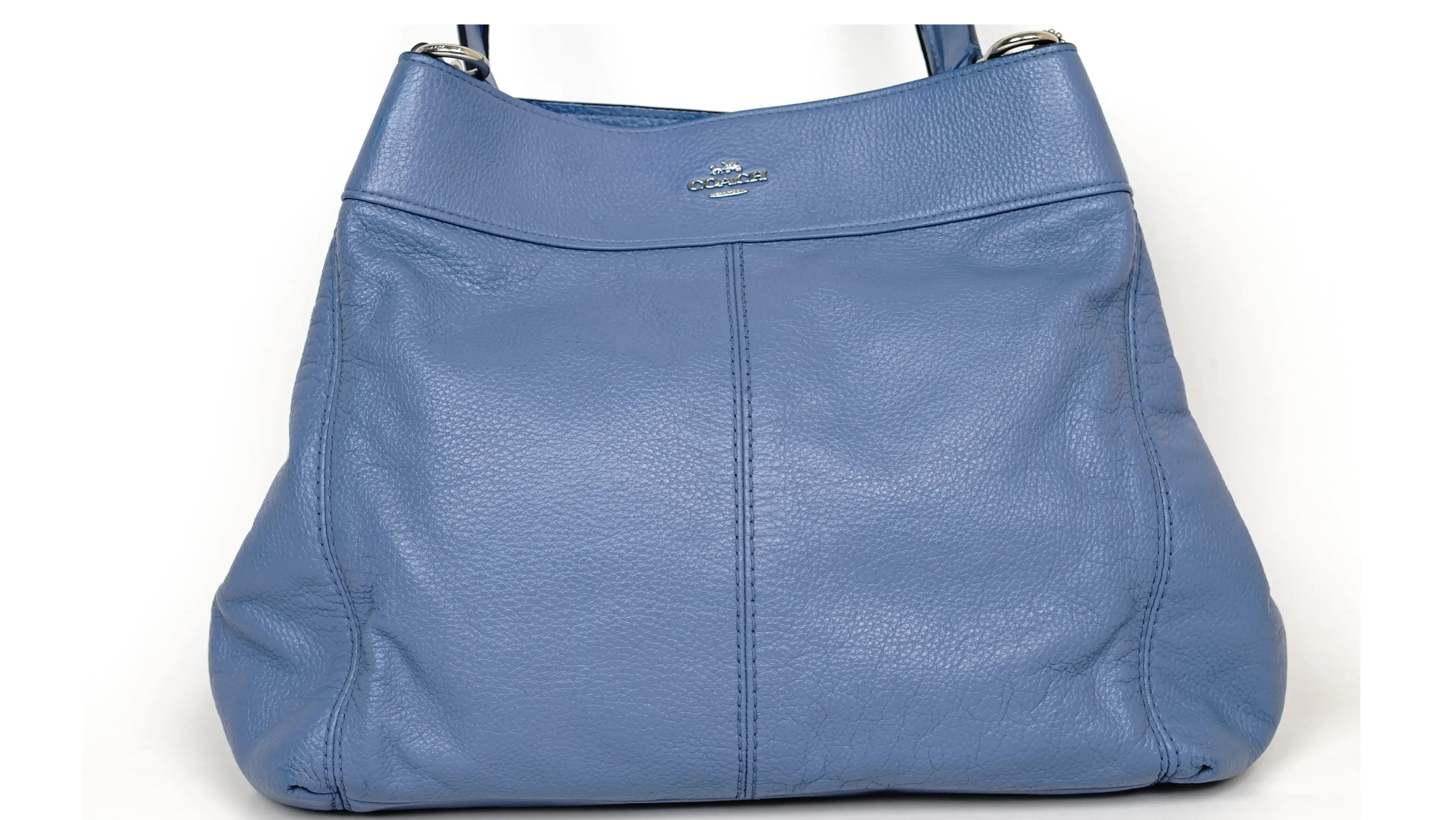 Before Coach handbag restoration faded leather with uneven colour and surface dullness