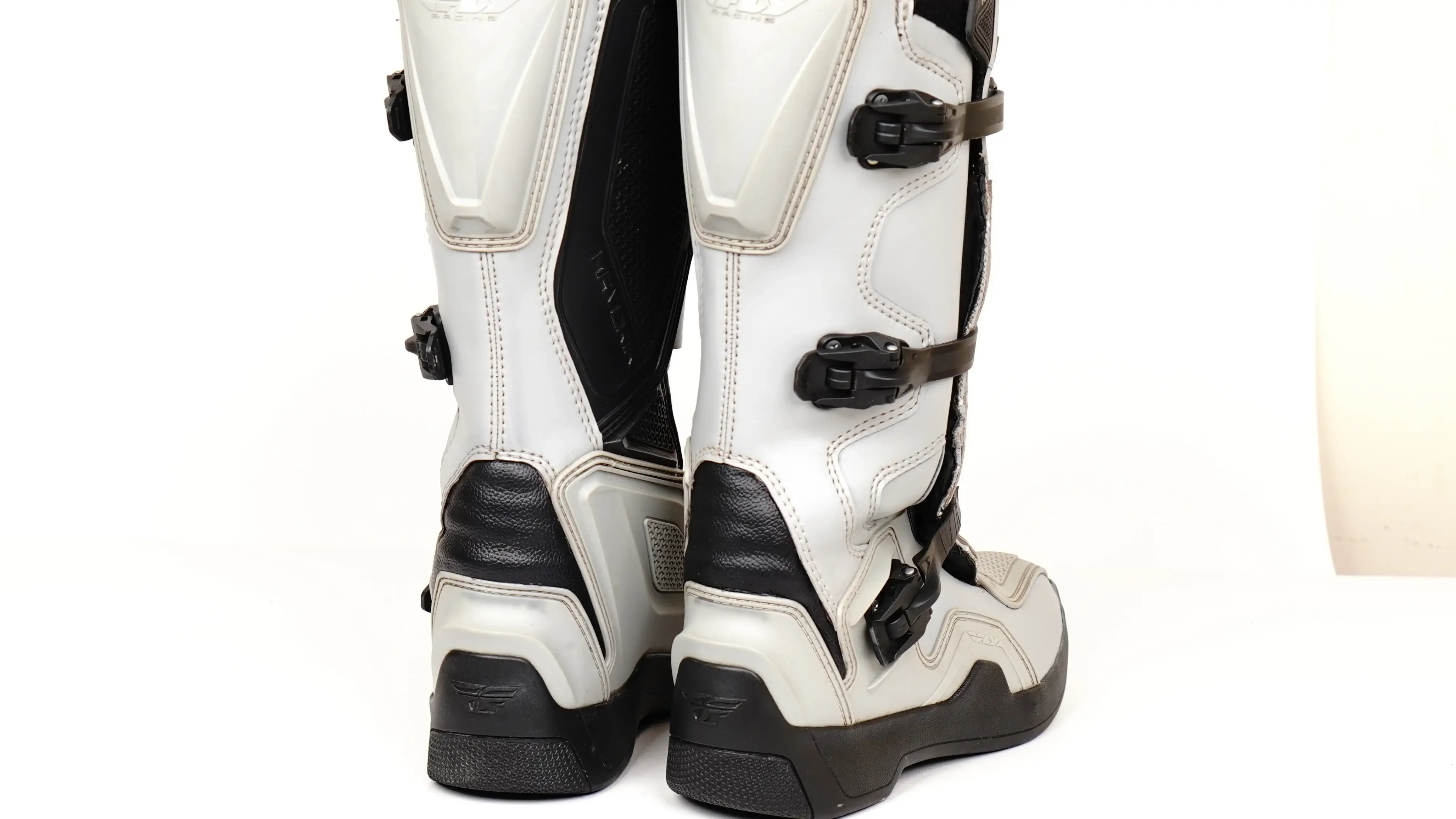 Before Rider boots restoration cracked PU panels with peeling and surface dullness