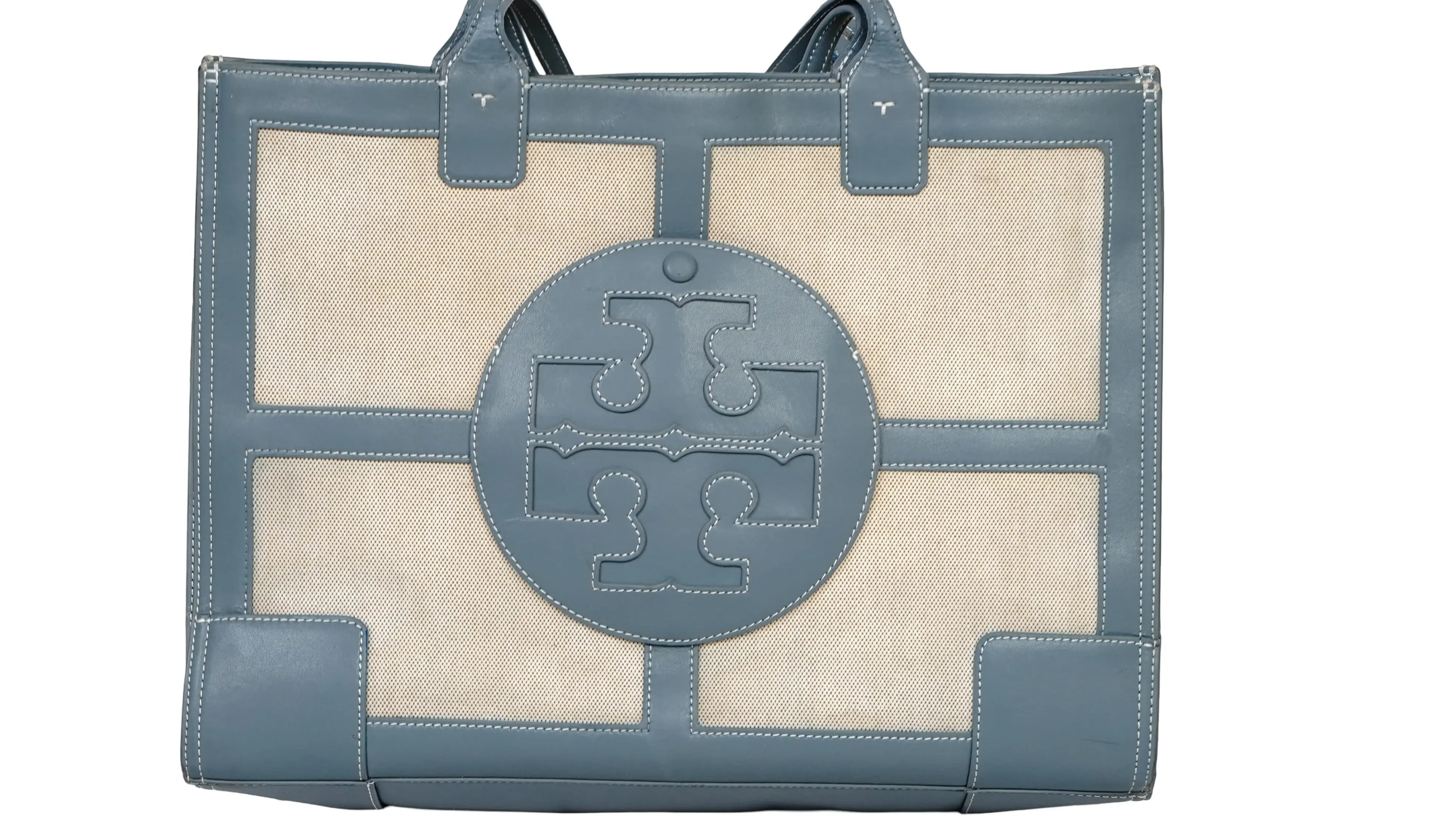 Before Tory Burch cleaning and colour restoration showing dirt and faded tone